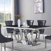 Mesa de comedor 4 aros mármol negro y plateado 200 x 100 cm.