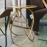 Mesa auxiliar dorada con espejo 44 cm.