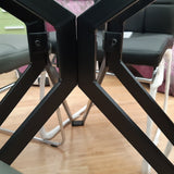 Mesa moderna redonda minimal negra y cristal 110 cm