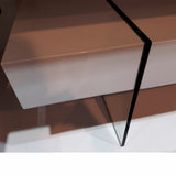 Mesa de centro de cristal y caja blanca 110 x 60 cm.