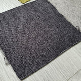 Sillón Mid Century respaldo curvo tapizado gris